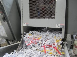 A machine that is full of shredded papers.